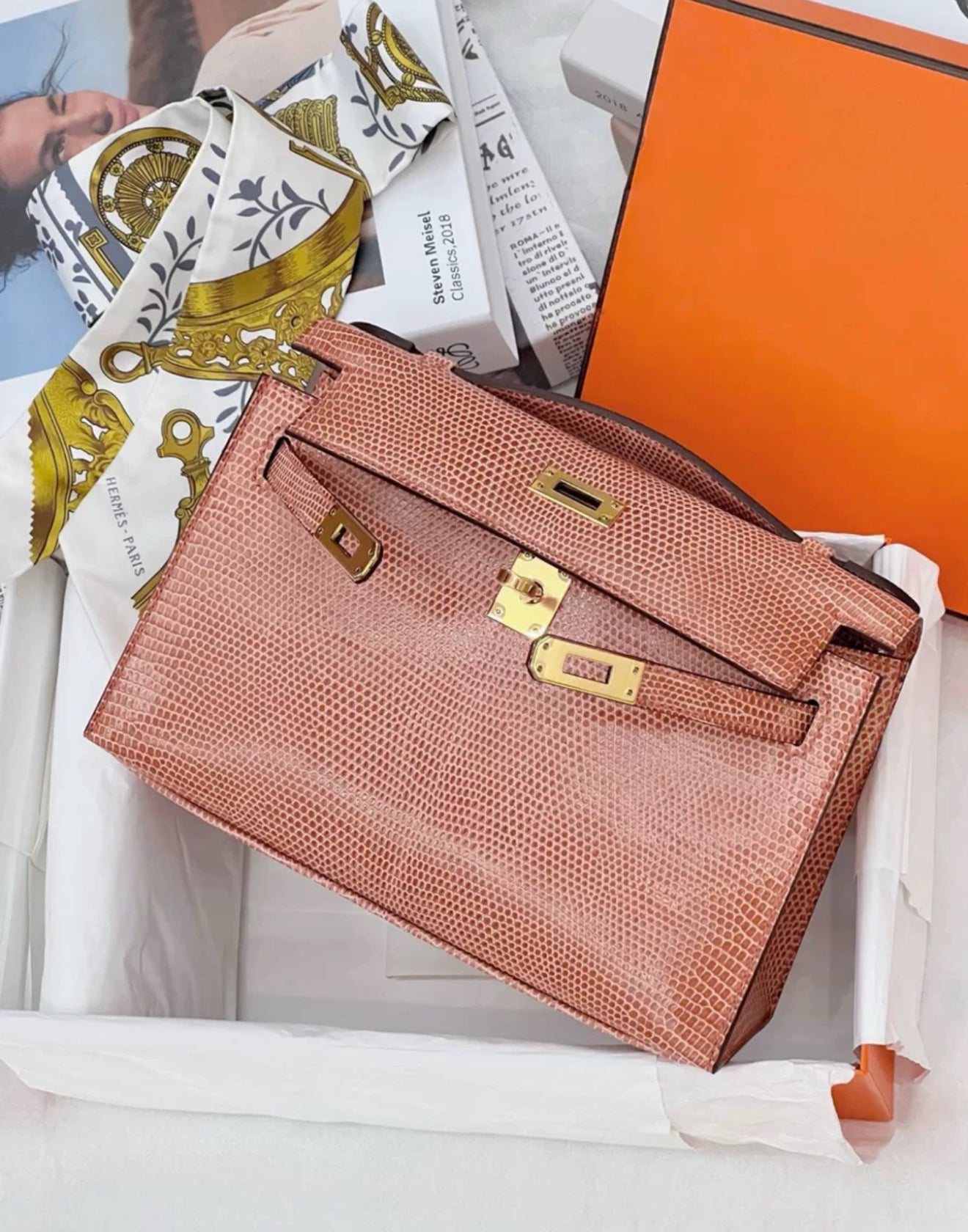 Hermès Kelly Pochette Pink lizard Gold Hardware
