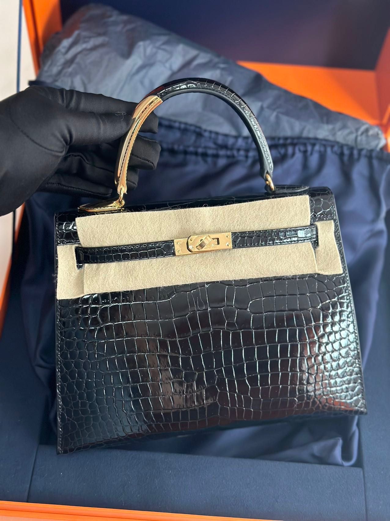 Hermès Kelly Midas 25 Noir Shiny Crocodile Porosus 18k yellow gold hardware  handle