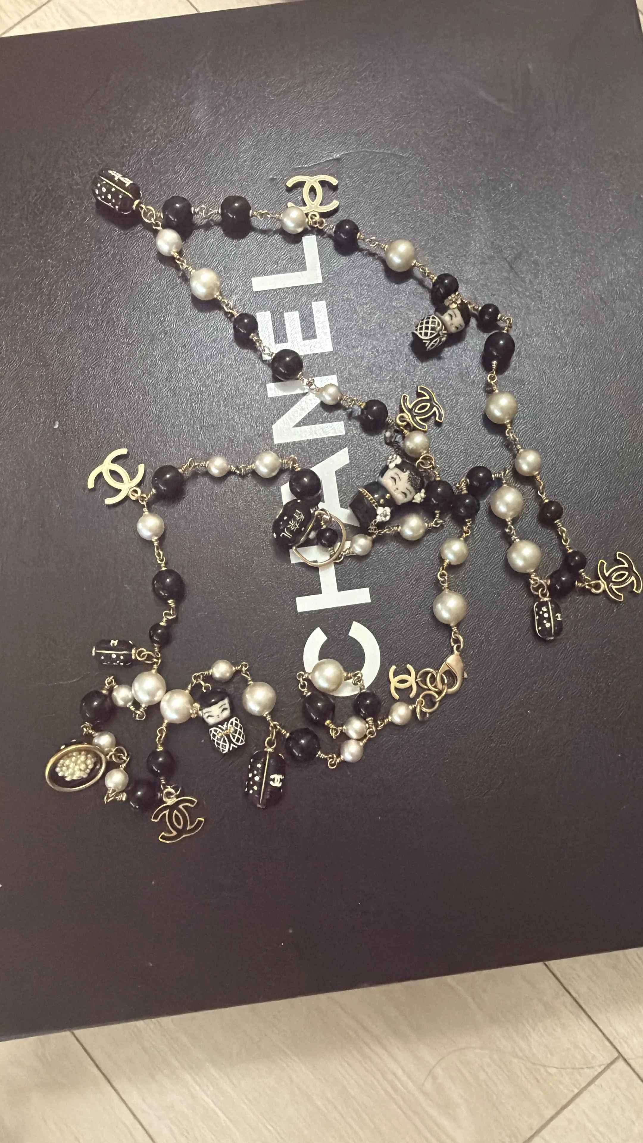 Chanel 10A Paris Shanghai Matryoshka Doll Pearl Charm Necklace/Belt — Ultra-Rare Collector Piece