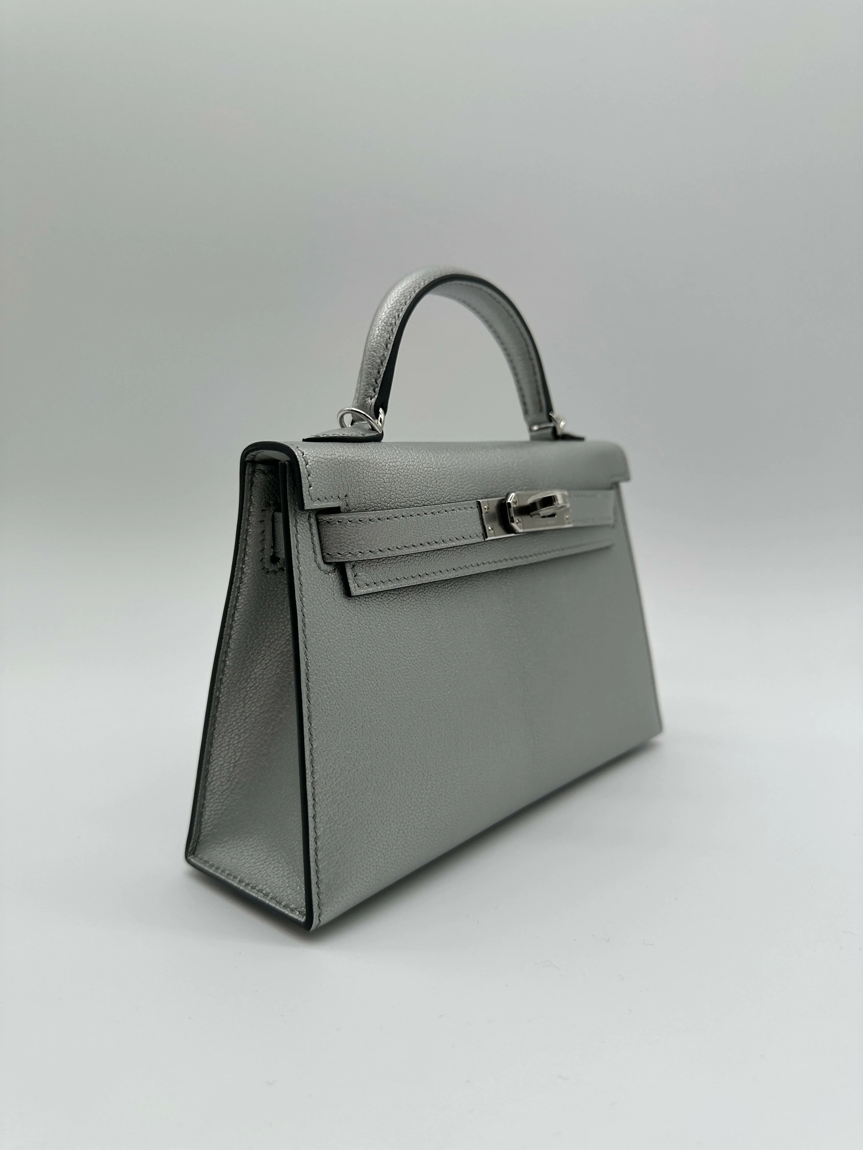 Hermès Kelly 20 Argent Chèvre PHW K 2026