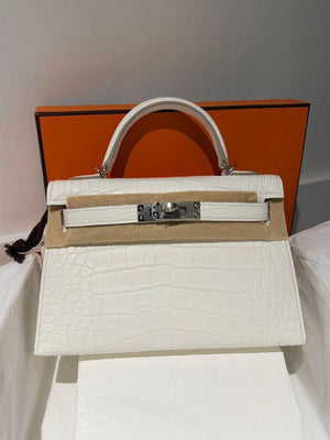 Hermès Mini Kelly 20 Creme Chantilly Matte Porosus Palladium hardware