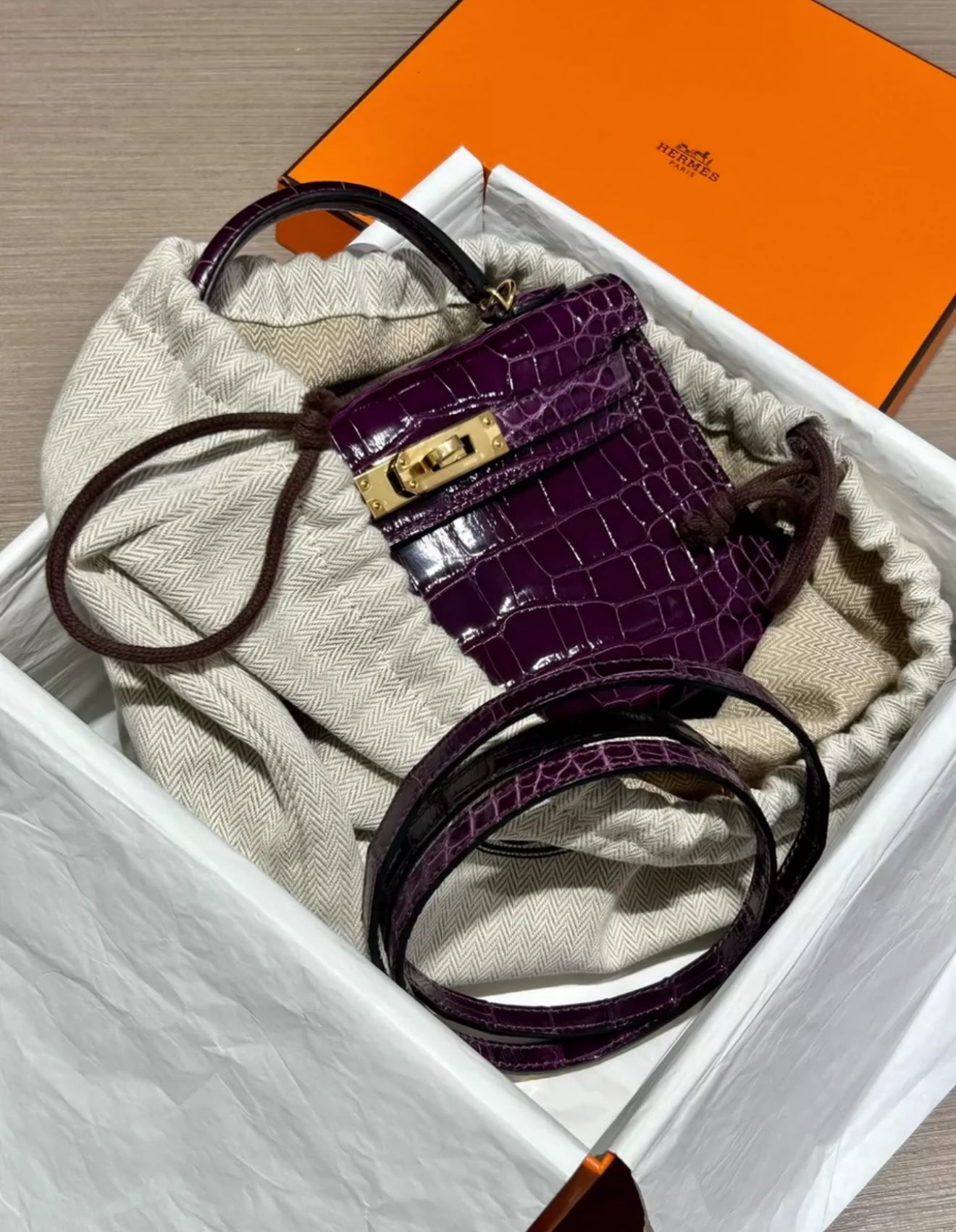 HERMÈS KELLY 20 MINI SELLIER AMETHYST SHINY ALLIGATOR WITH GOLD HARDWARE