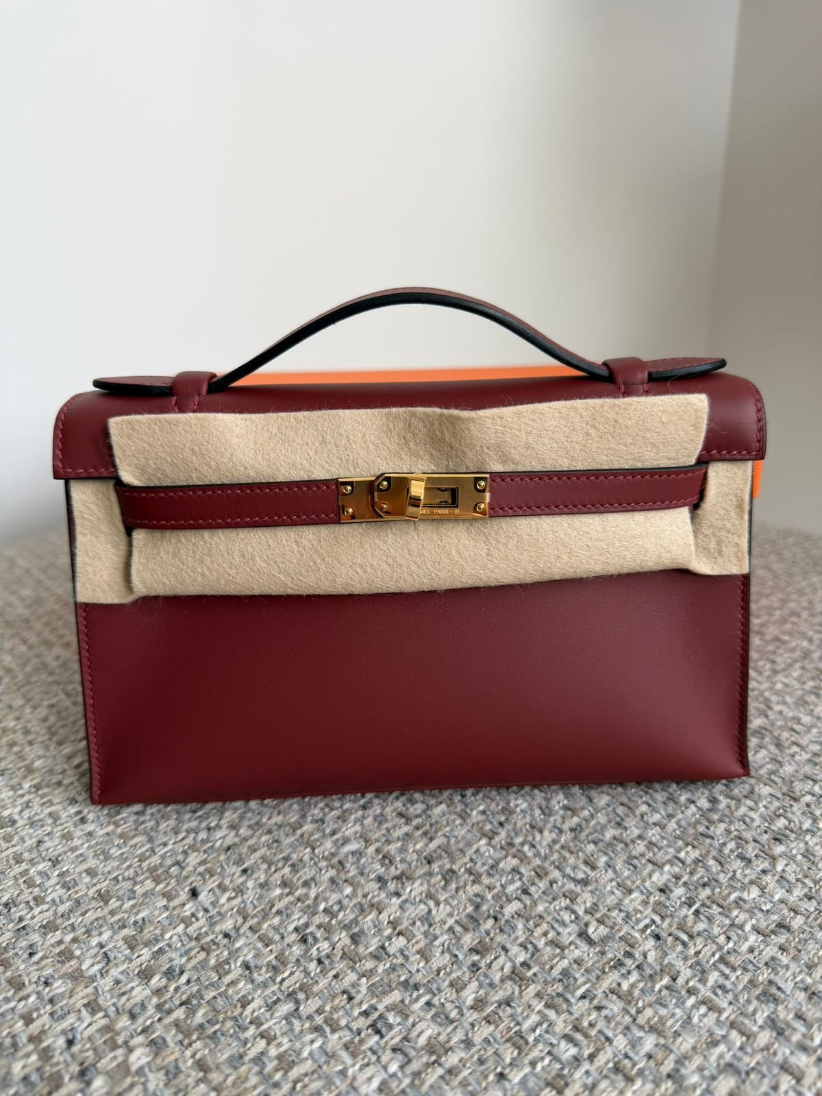Hermès Kelly pochette Rouge H Swift Gold hardware