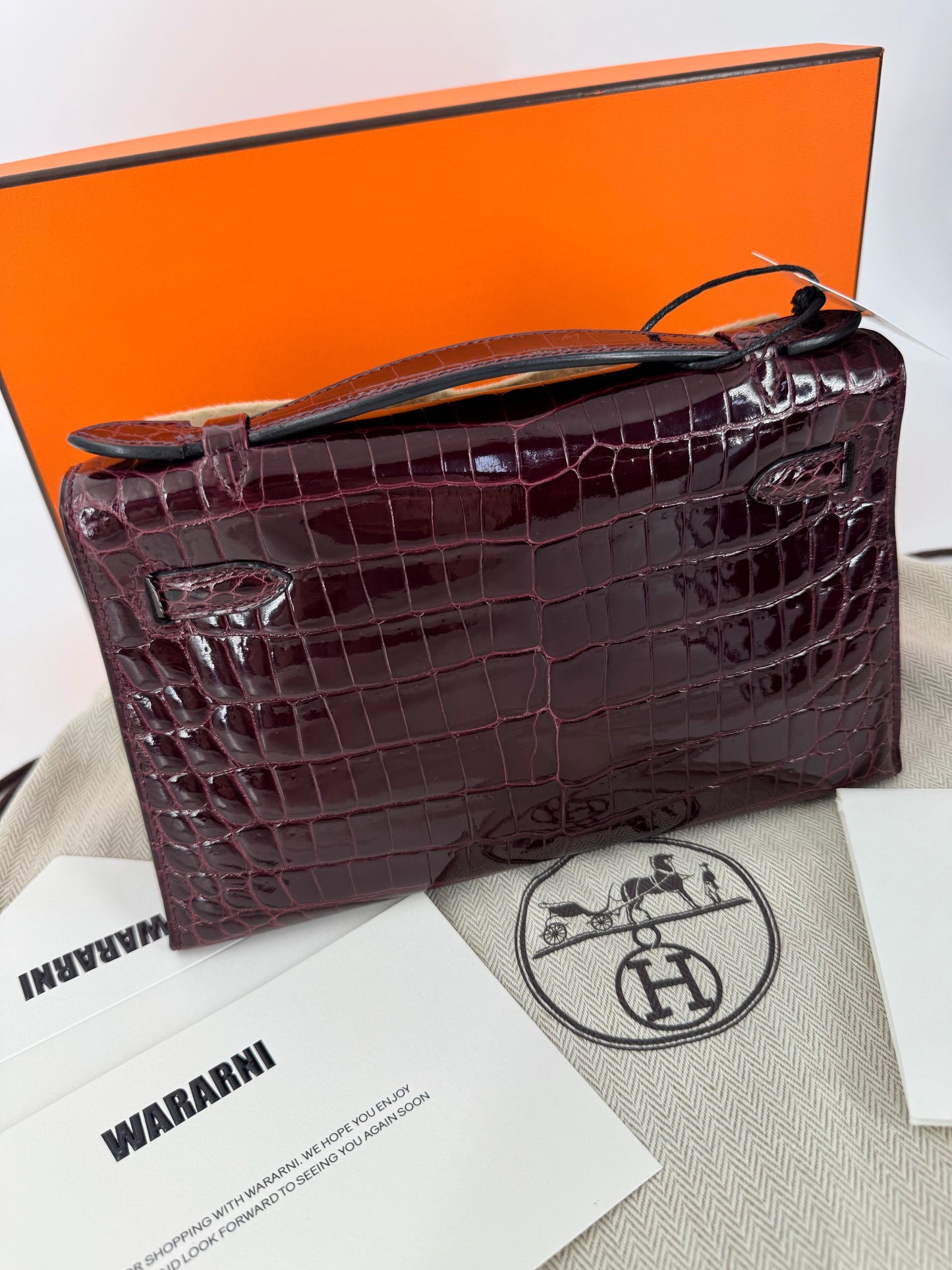Hermes Kelly pochette Bordeaux shiny Alligator leather Palladium hardware