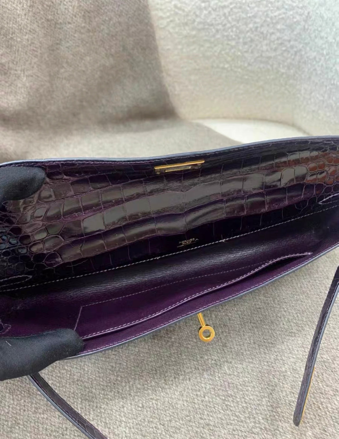 Hermès Kelly Cut Amethysts shiny Crocodile with gold hardware Clutch