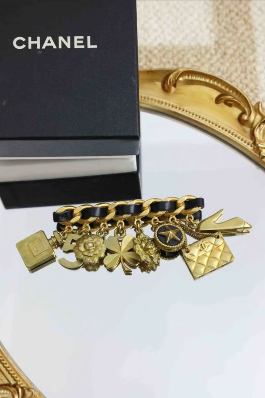 Chanel leather chain pendant brooch