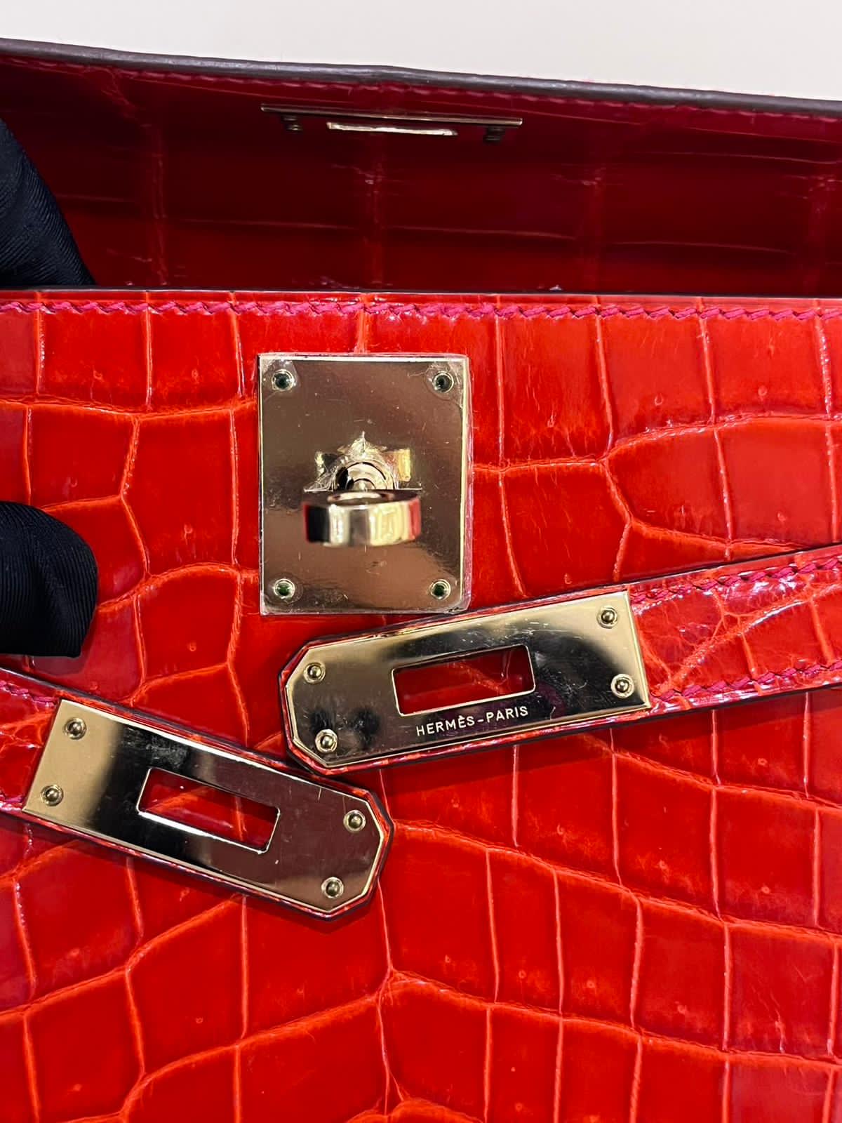 Hermes Kelly cut red shiny crocodile leather gold hardware