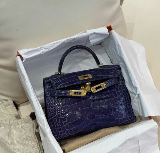 Hermès Mini Kelly Blue shiny alligator leather Gold Hardware