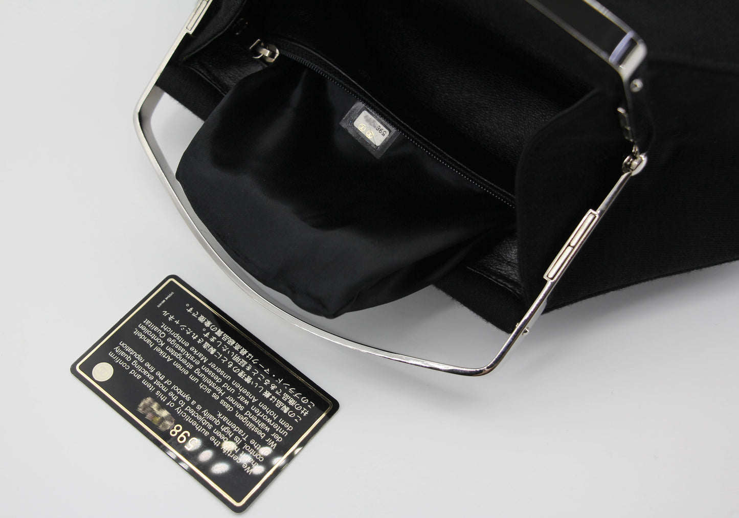 Chanel vintage black clutch with silver hardware handle