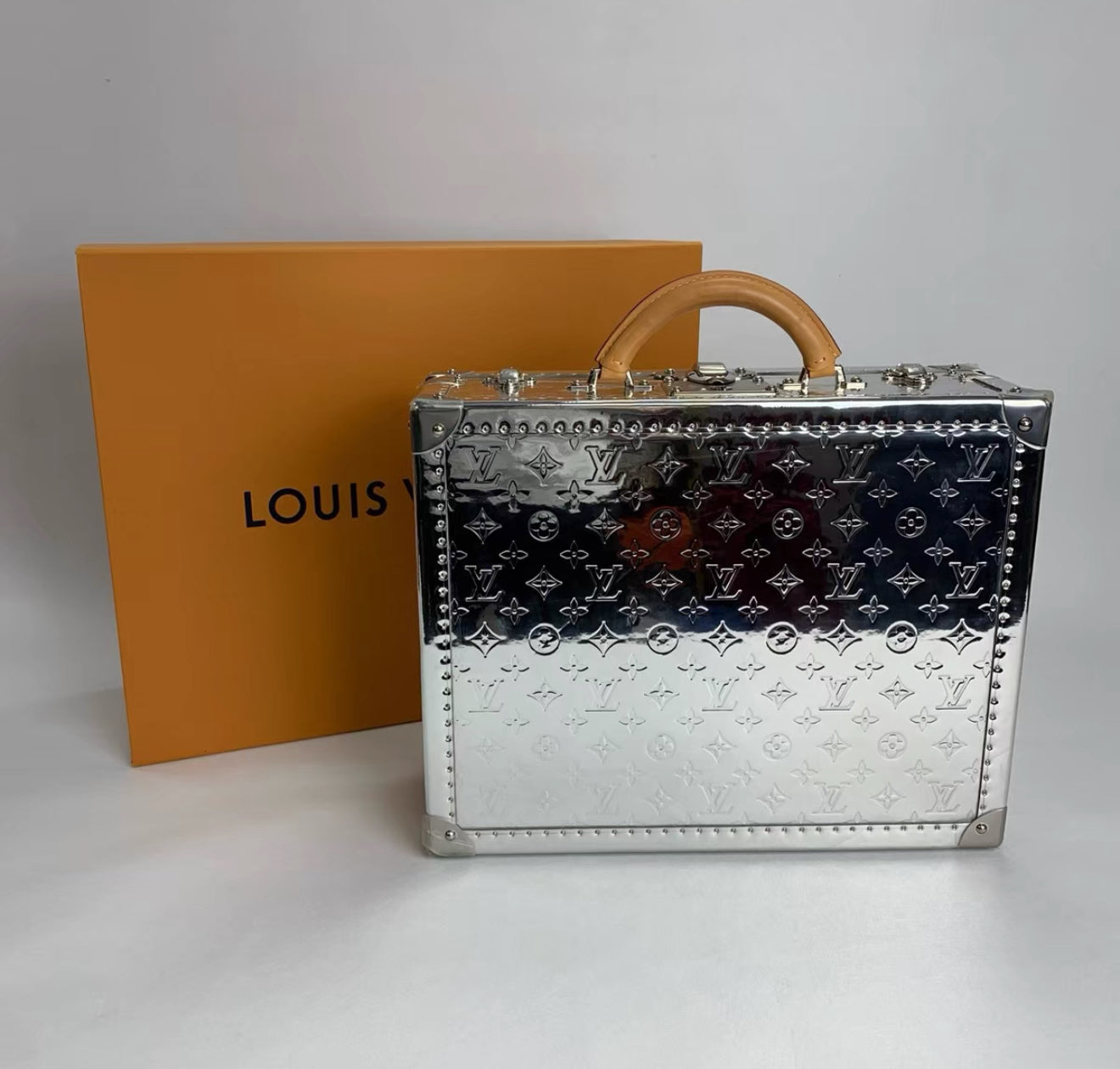 LOUIS VUITTON Silver Mirror Monogram Vinyl  Vachetta Leather Cotteville 40
