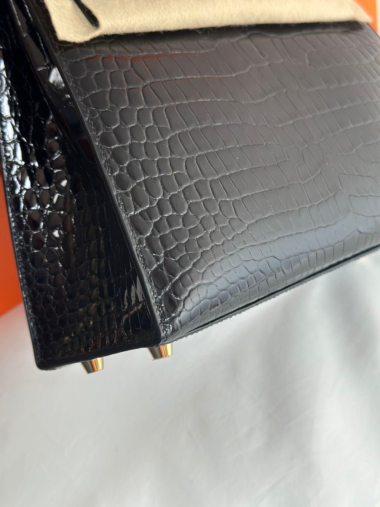 Hermès Kelly Midas 25 Noir Shiny Crocodile Porosus 18k yellow gold hardware  handle