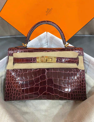 Hermes kelly 20 bordeaux shiny alligator leather with gold hardware