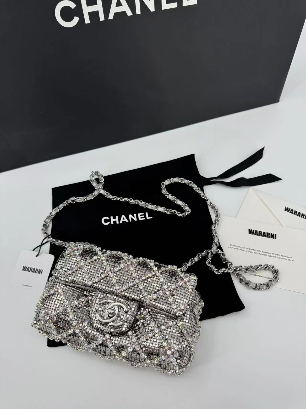 Chanel 22 diamond quilting silver-tone CC Mini Flap Bag