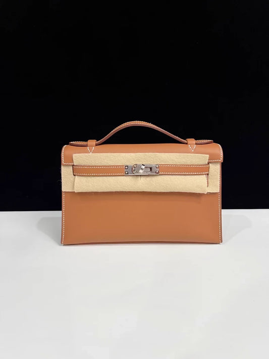 HERMES Kelly Pochette Gold swift leather palladium hardware