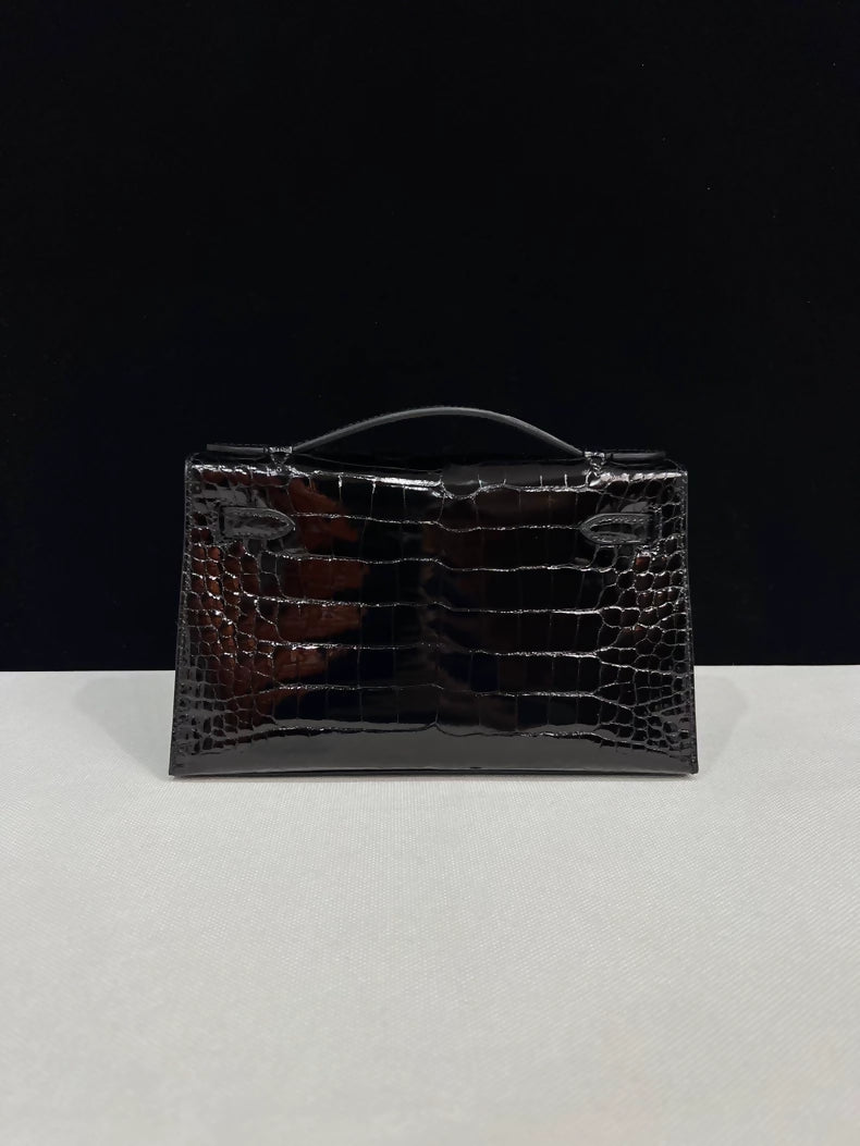 Hermes Kelly Pochette Black shiny Crocodile Leather with palladium hardware
