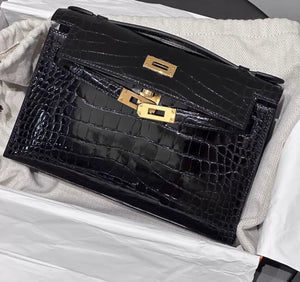 Hermes kelly pochette black shiny crocodile leather gold hardware