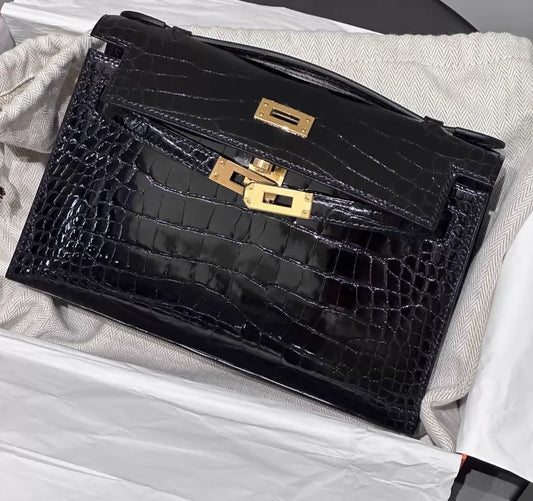 Hermes kelly pochette black shiny crocodile leather gold hardware