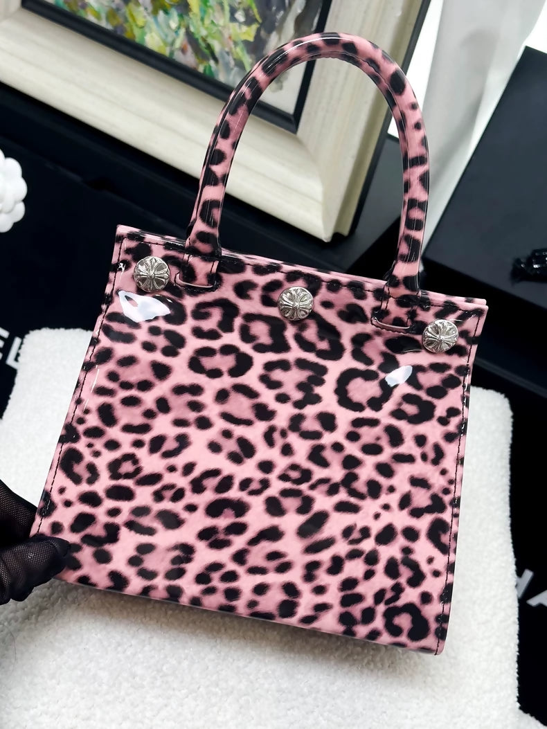 Chrome Hearts mini handbag in pink patent leather with leopard print
