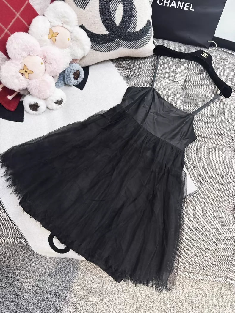 Chanel pink dress with a black tulle lining