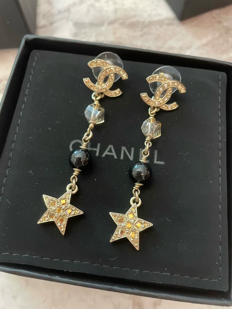 Chanel star tassel earrings