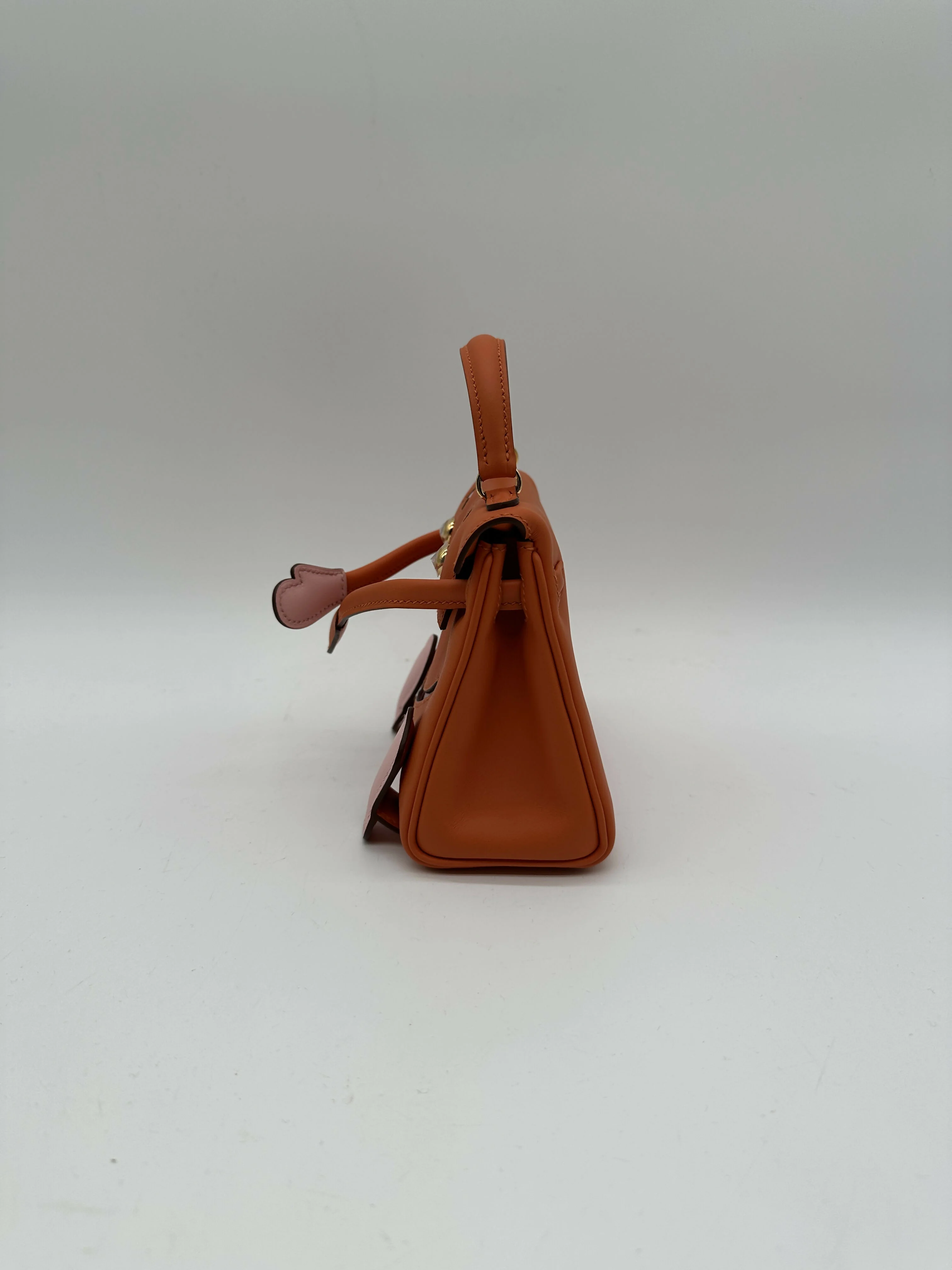 Hermès Kelly Doll Orange / Rose Sakura PHW W 2026