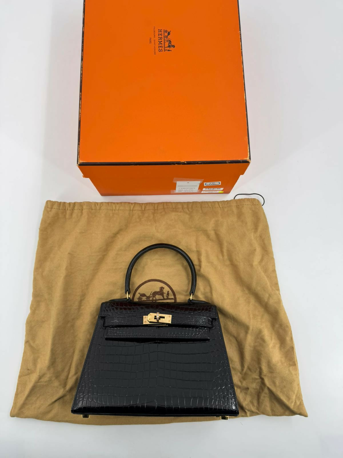 Hermès Kelly 20 Sellier Noir Shiny Niloticus Crocodile with GHW and Round Brilliant Cut Diamonds