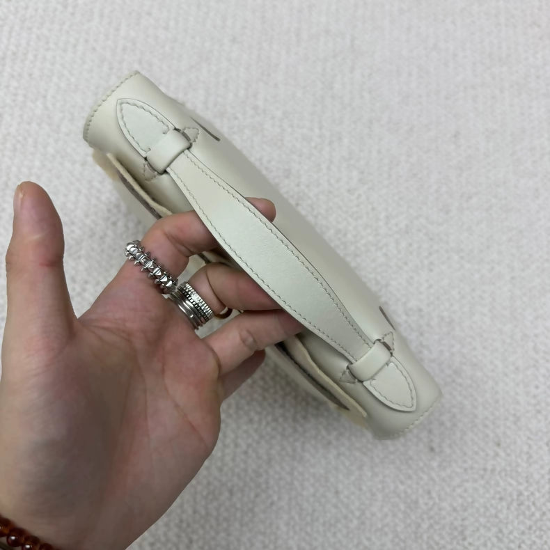 Hermes Kelly pochette craie Swift leather champagne gold hardware