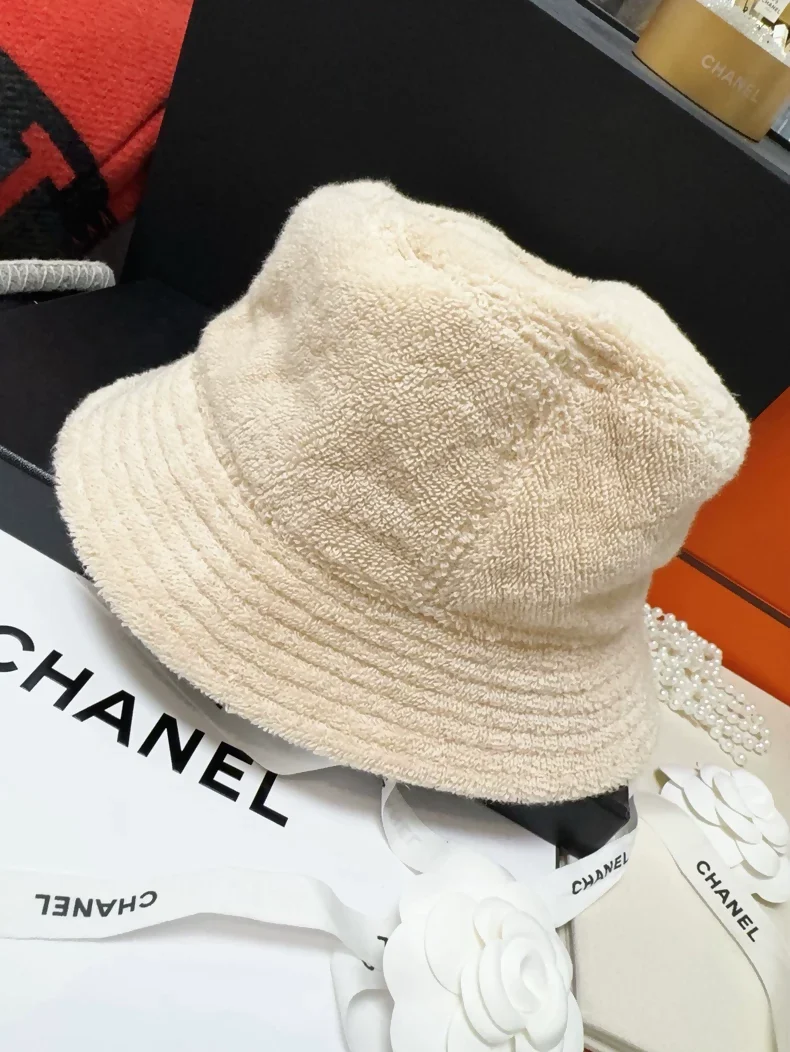 Chanel classic khaki hat with navy blue terry cloth lining