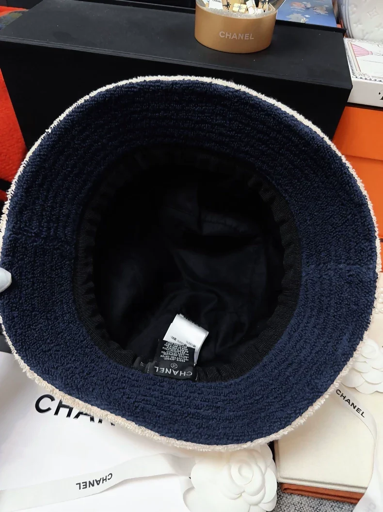 Chanel classic khaki hat with navy blue terry cloth lining