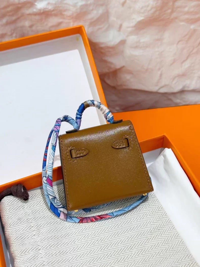 Hermes Kelly bag in tafelakt leather with Twilly bag charm