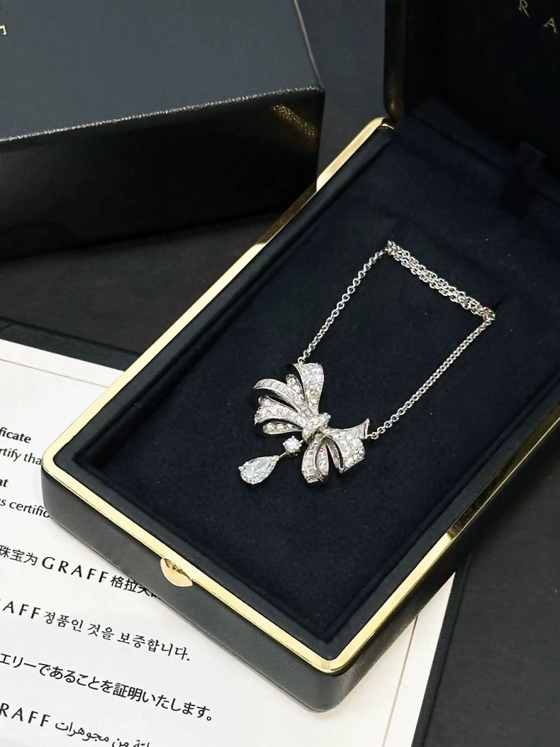Tildas Bow Graff necklace in white gold  diamonds