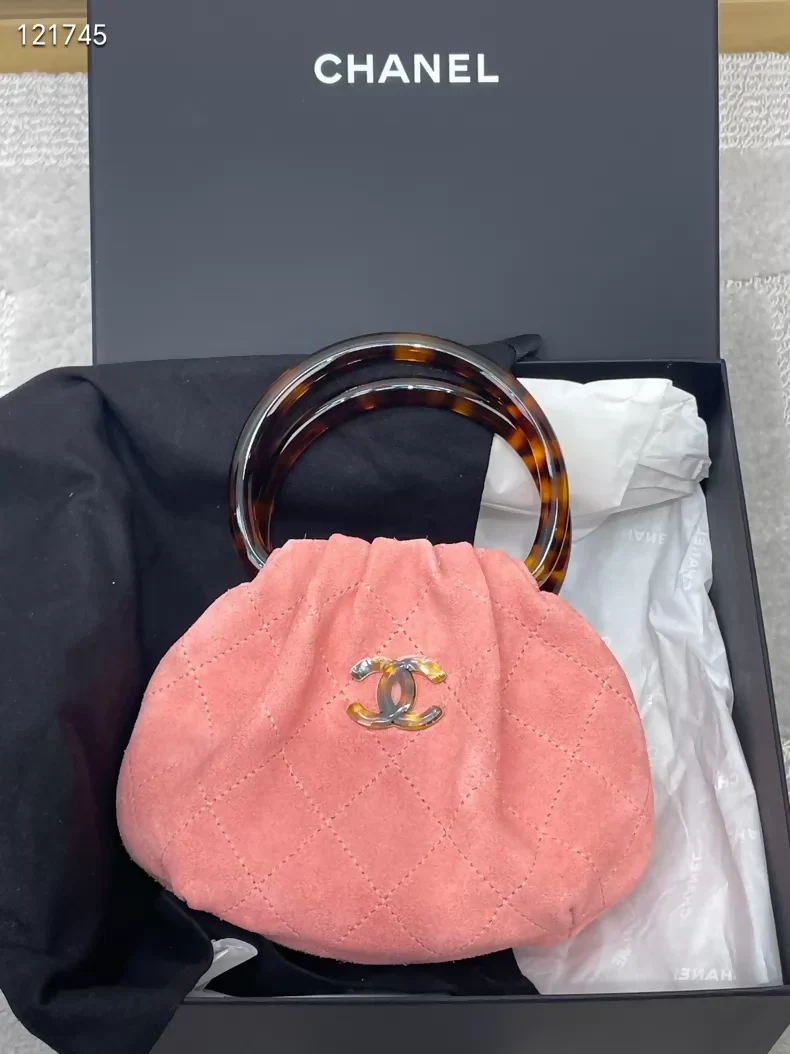 Chanel 26C tortoiseshell handle pink suede handbag