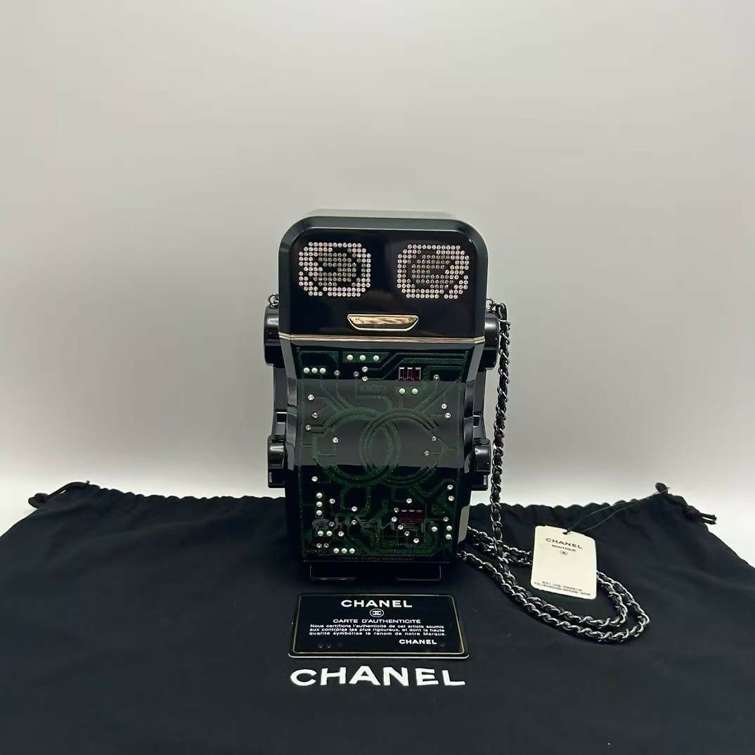 pre-owned chanel limited edition robot minaudière bag black plexiglass and crystals ruthenium hardware