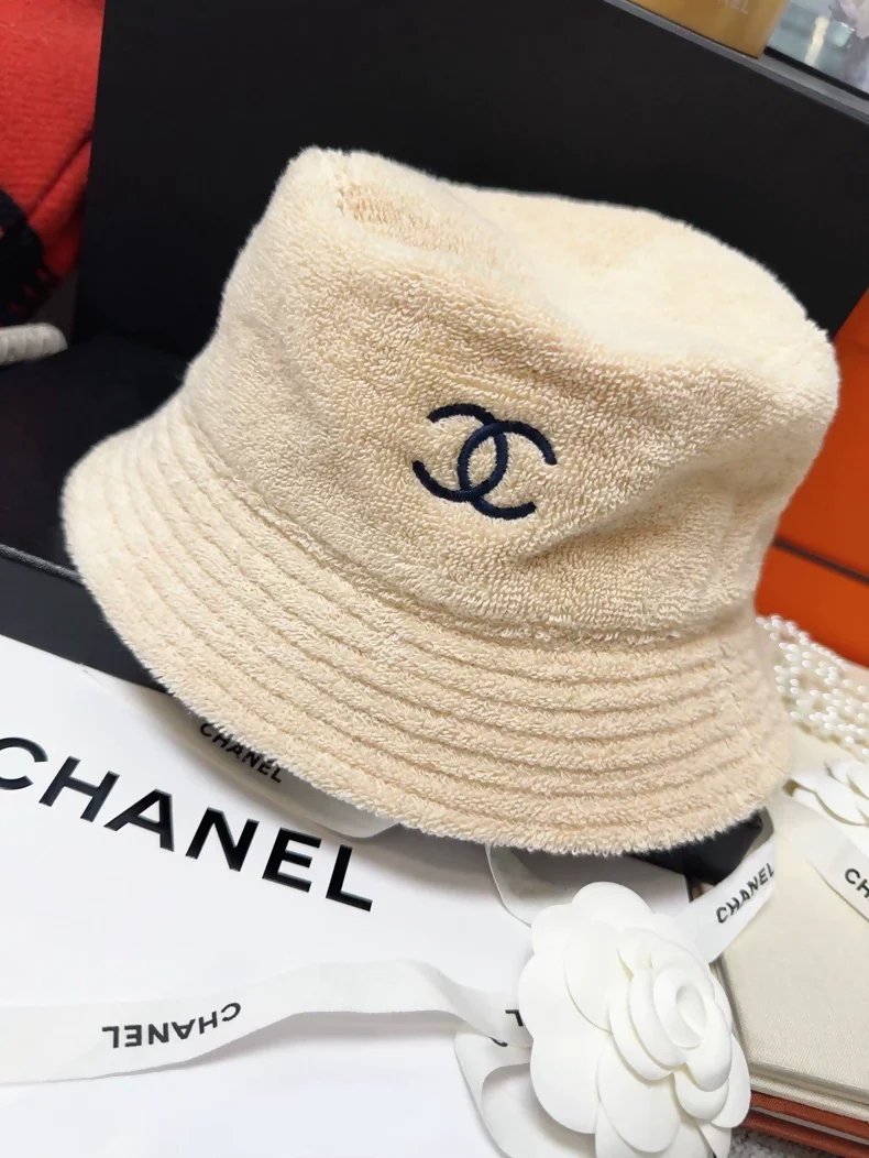 Chanel classic khaki hat with navy blue terry cloth lining