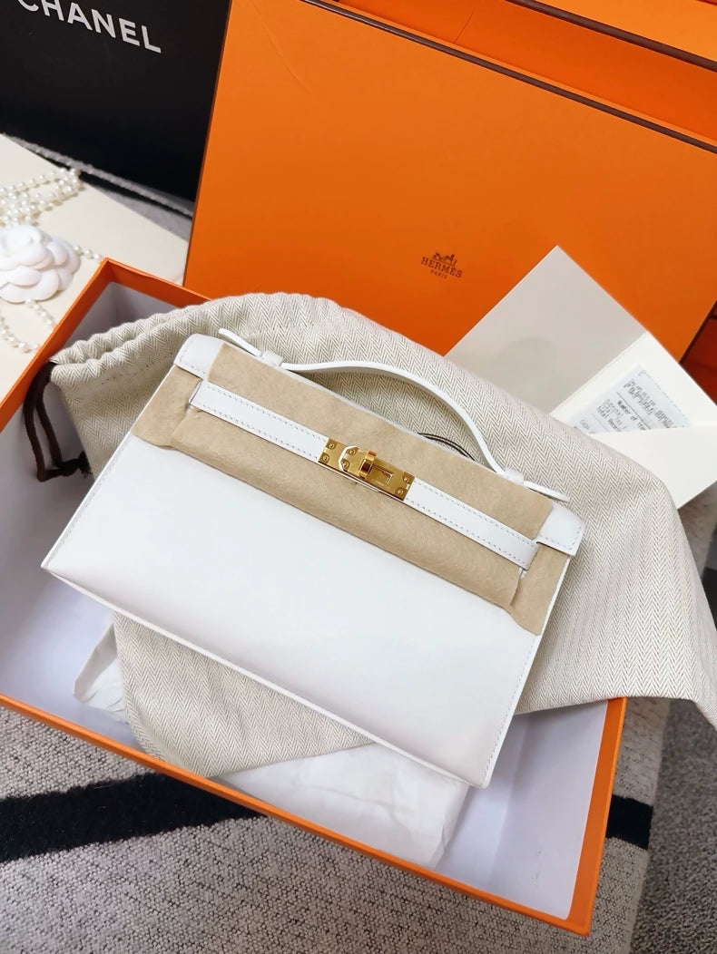 Hermes Kelly pochette pure white swift leather gold hardware