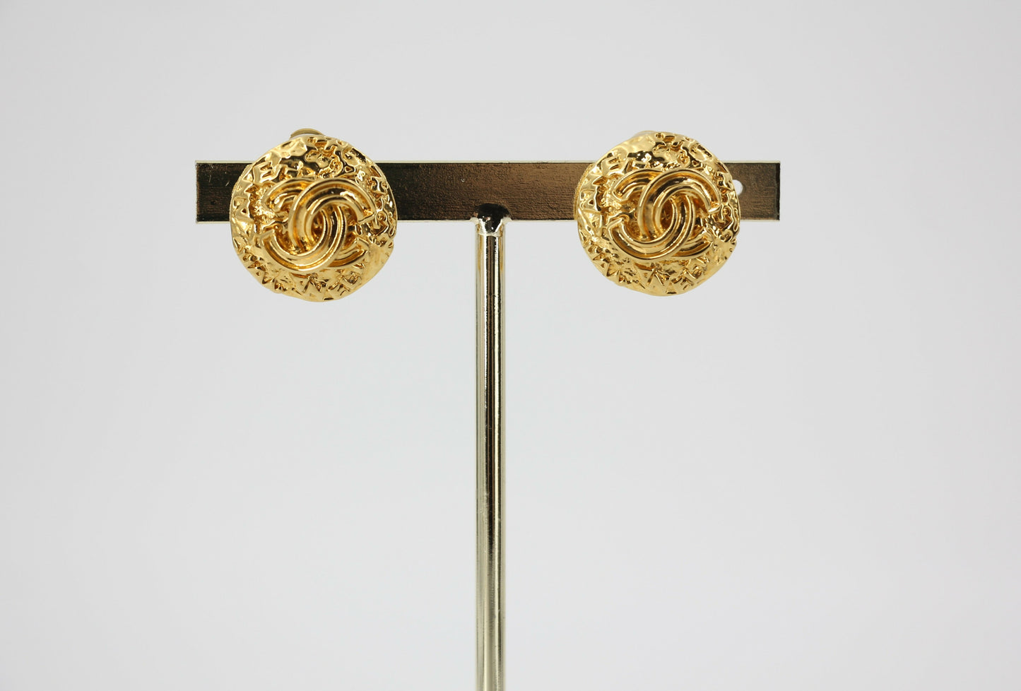 Chanel Vintage 95A Gold Plated Embossed Round CC Clip-on Earrings