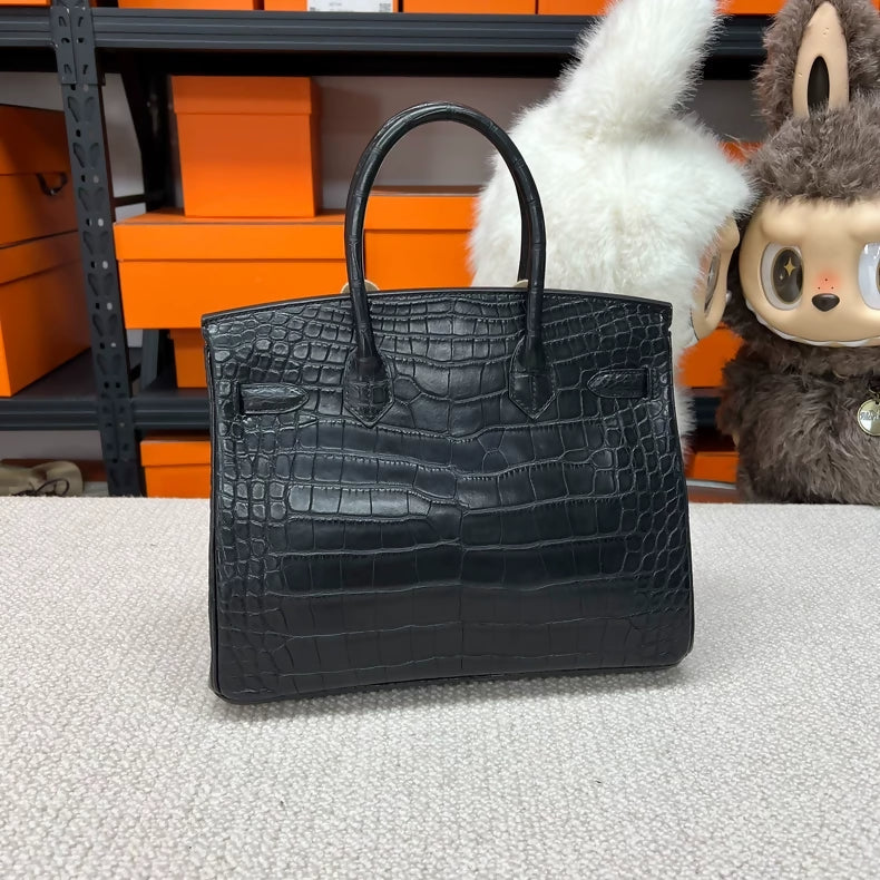 Hermes Birkin 30 black and gold matte crocodile leather gold hardware