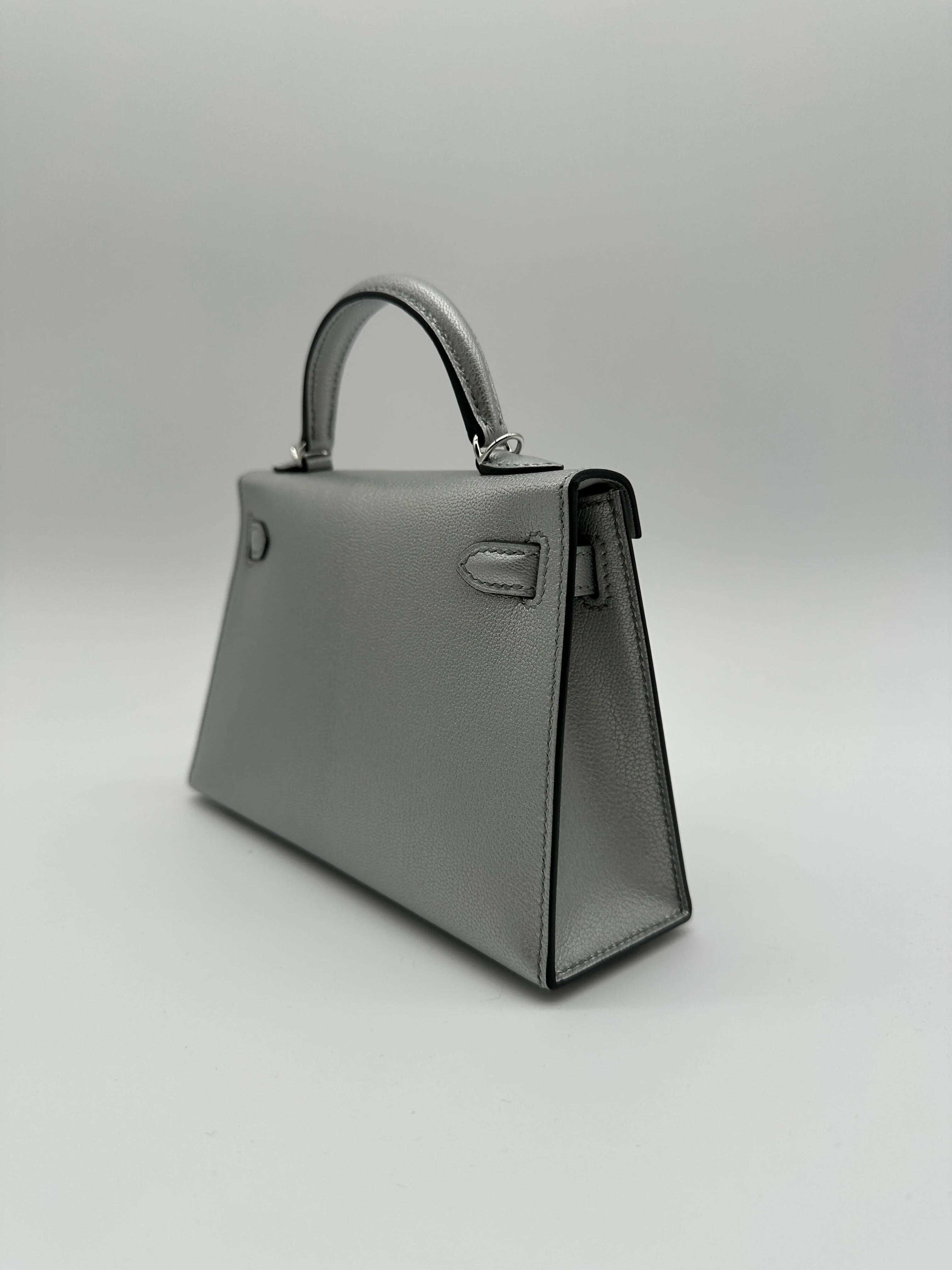 Hermès Kelly 20 Argent Chèvre PHW K 2026