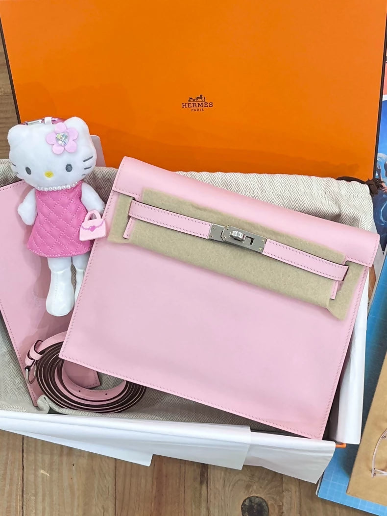 Hermès Kelly Danse bag in cherry pink, silver trim, Swift leather, K engraving, new.