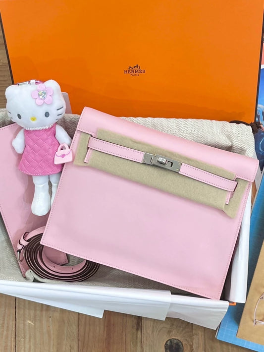 Hermès Kelly Danse bag in cherry pink, silver trim, Swift leather, K engraving, new.