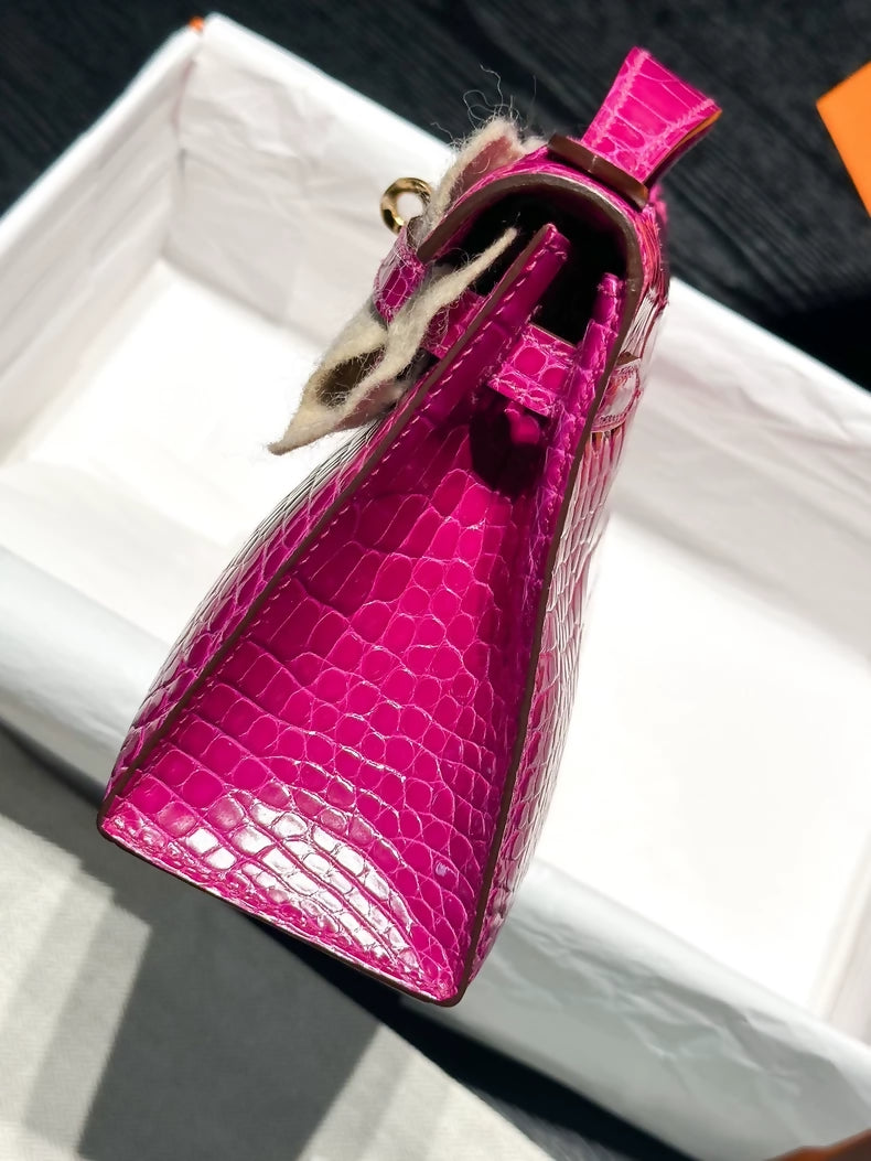 Hermes kelly pochette J5 Rose Scheherezade shiny crocodile leather gold hardware