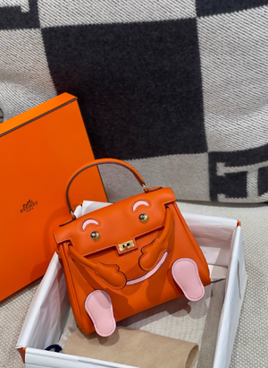 Limited Edition Hermes kelly doll Orange Rose Sakura Swift leather with Gold Hardware