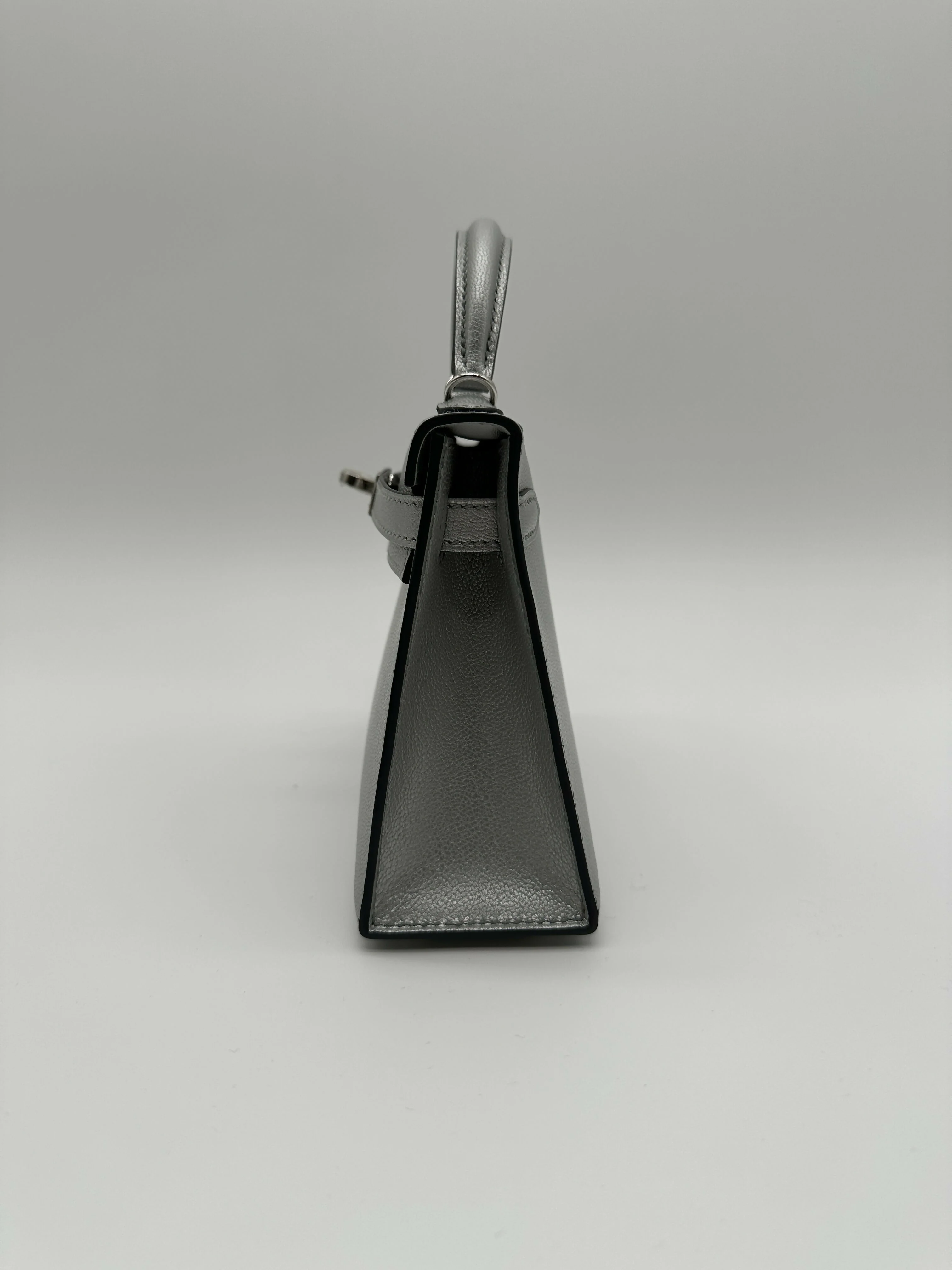 Hermès Kelly 20 Argent Chèvre PHW K 2026