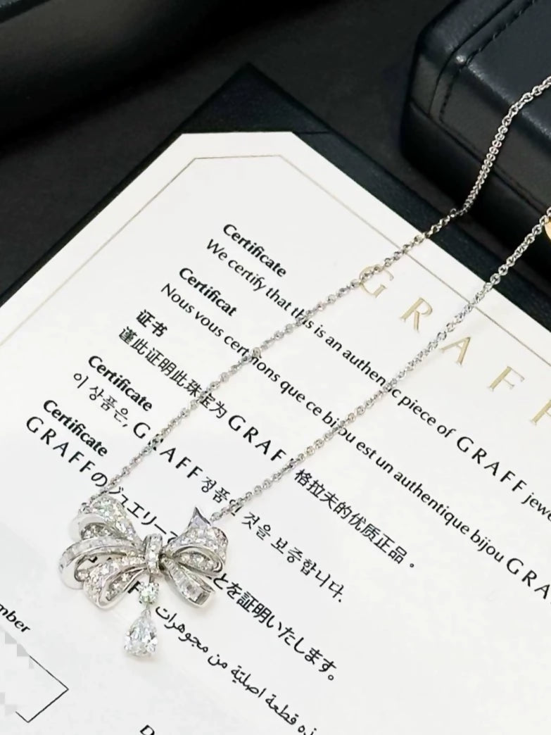 Tildas Bow Graff necklace in white gold  diamonds