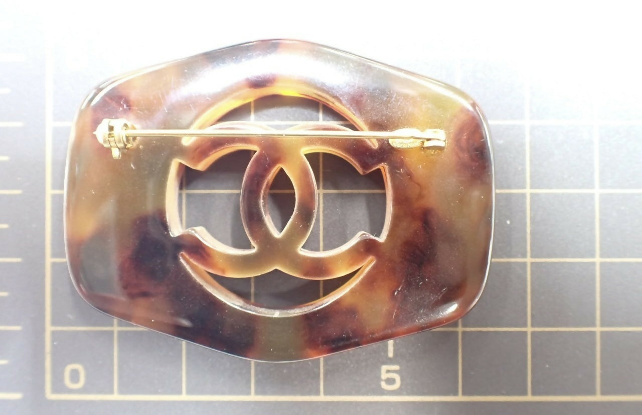 Chanel Vintage 97P Acrylic Tortoise Carved Quilted Hollow CC Logo Brooch