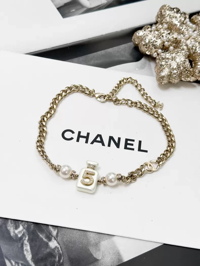 Chanel Spring/Summer 2022 Collection No. 5 white perfume bottle choker necklace