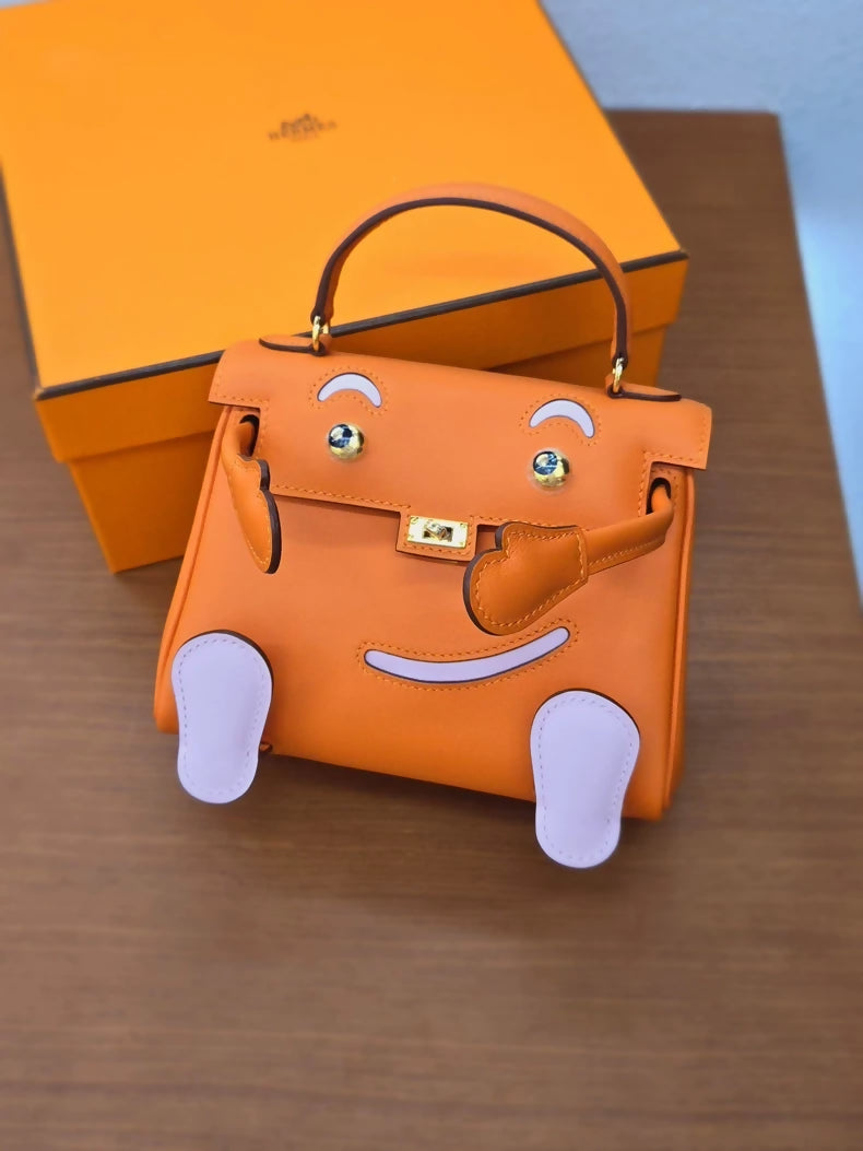 Hermès Kelly Doll orange, Sakura pink, Swift leather gold hardware