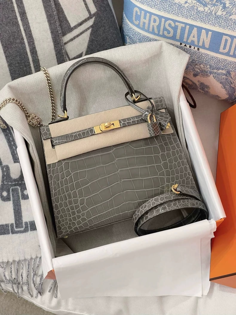 Hermès Kelly 25 0V crystal grey shiny crocodile leather gold hardware