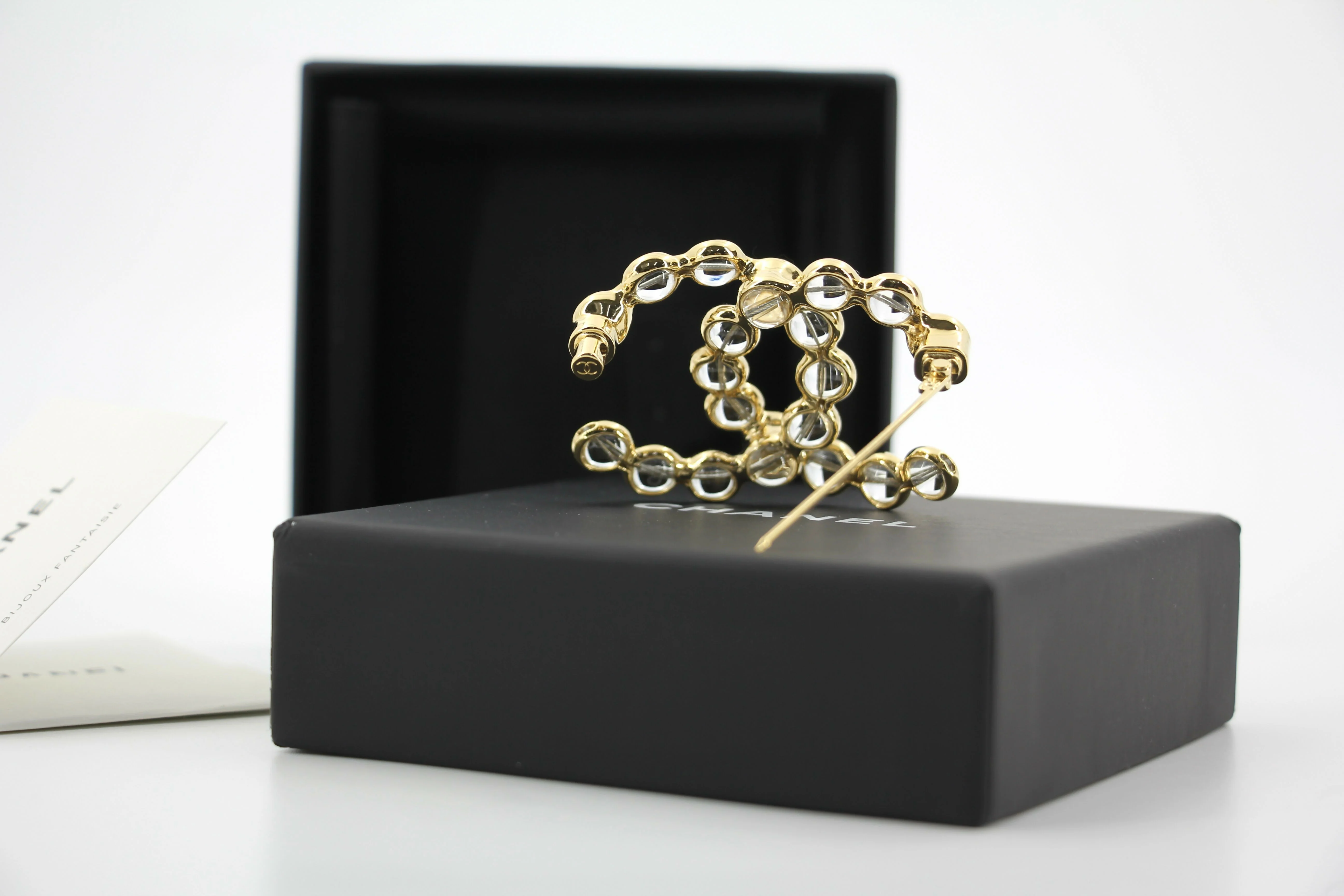 Chanel A24S Acrylic CC Champagne Gold Transparent Brooch