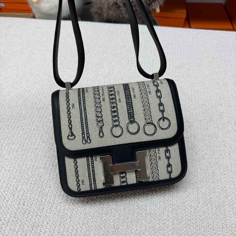 Hermès Constance 24 black leather  grey canvas palladium hardware